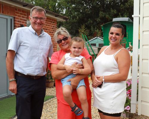 Michael Newey of Broadland Housing with Emily Brazil centre her niece Emma Lee and her son William Lee sm