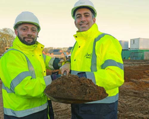 Nathan Clarke left and Paul LeGrice dig the first sod at Abel Homes site in Taverham sm