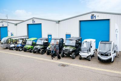 Electric Wheels founders Chris and Shirley Hurdle with the firms range of electric vehicles