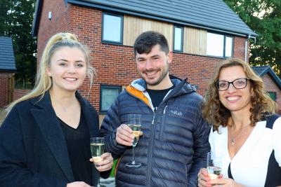 Homebuyers Anna Jolly and Dan Balls with Abel Homes sales and marketing manager Clare Cornish right
