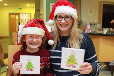 Rhiannon Kay and her mum Teresa Bell with Rhiannons charity Christmas card design sm