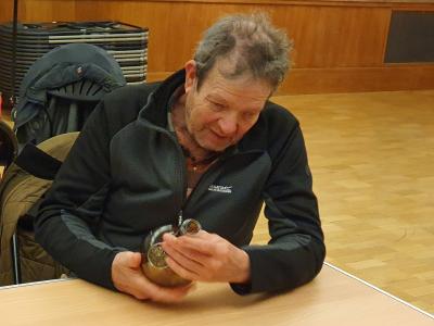 Stephen Seekings handles a replica of a wine bottle from the Gloucester at Norwich Castle Museum 1