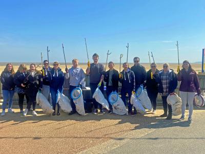 The group from Lovewell Blake cleaning Gorleston beach sm